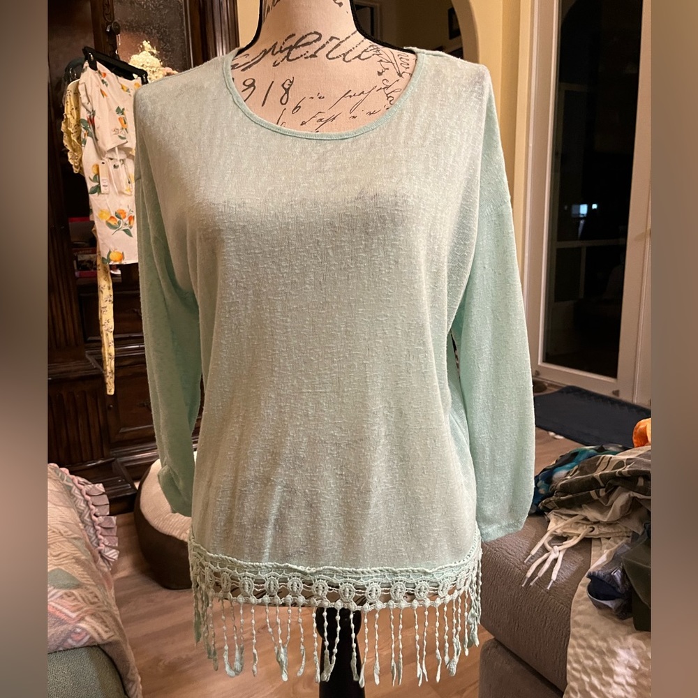 Cute light sweater size medium to large new no tags!